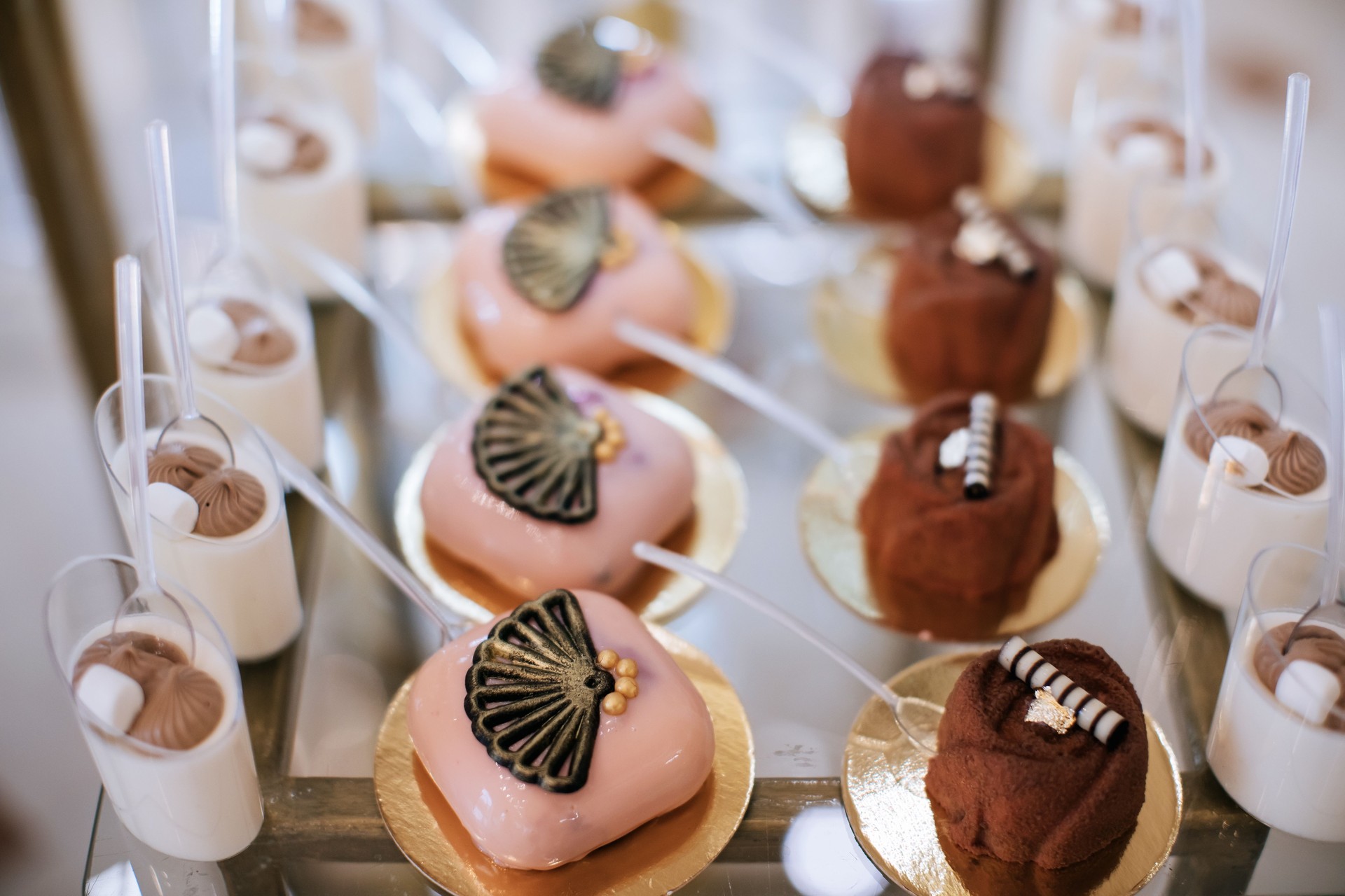 Various sweets on the table. Eclairs, cakes, candies